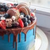 Fresh Fruits Cake | Chocolate macaroon cloud cake with fresh fruits layered in dubai