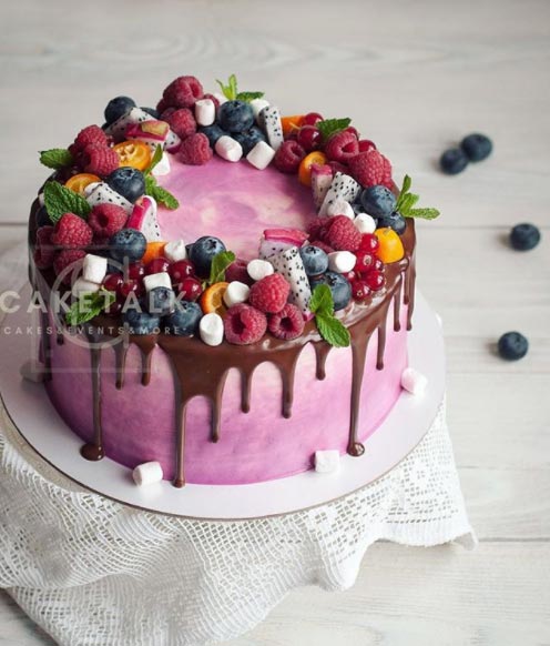Fresh Fruits Cake | Pink marshmallow and fruit cake for your anniversary in dubai