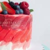 Fresh Fruits Cake | Pink petal ribbed berry fruits cake in dubai